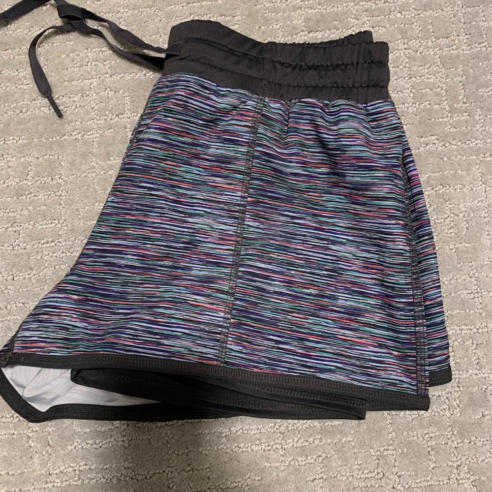 running shorts with built in spandex shorts. worn once. purchased from Macy’s.